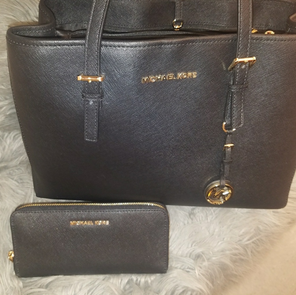 MK large Jet Set Traveler bag and wallet set.